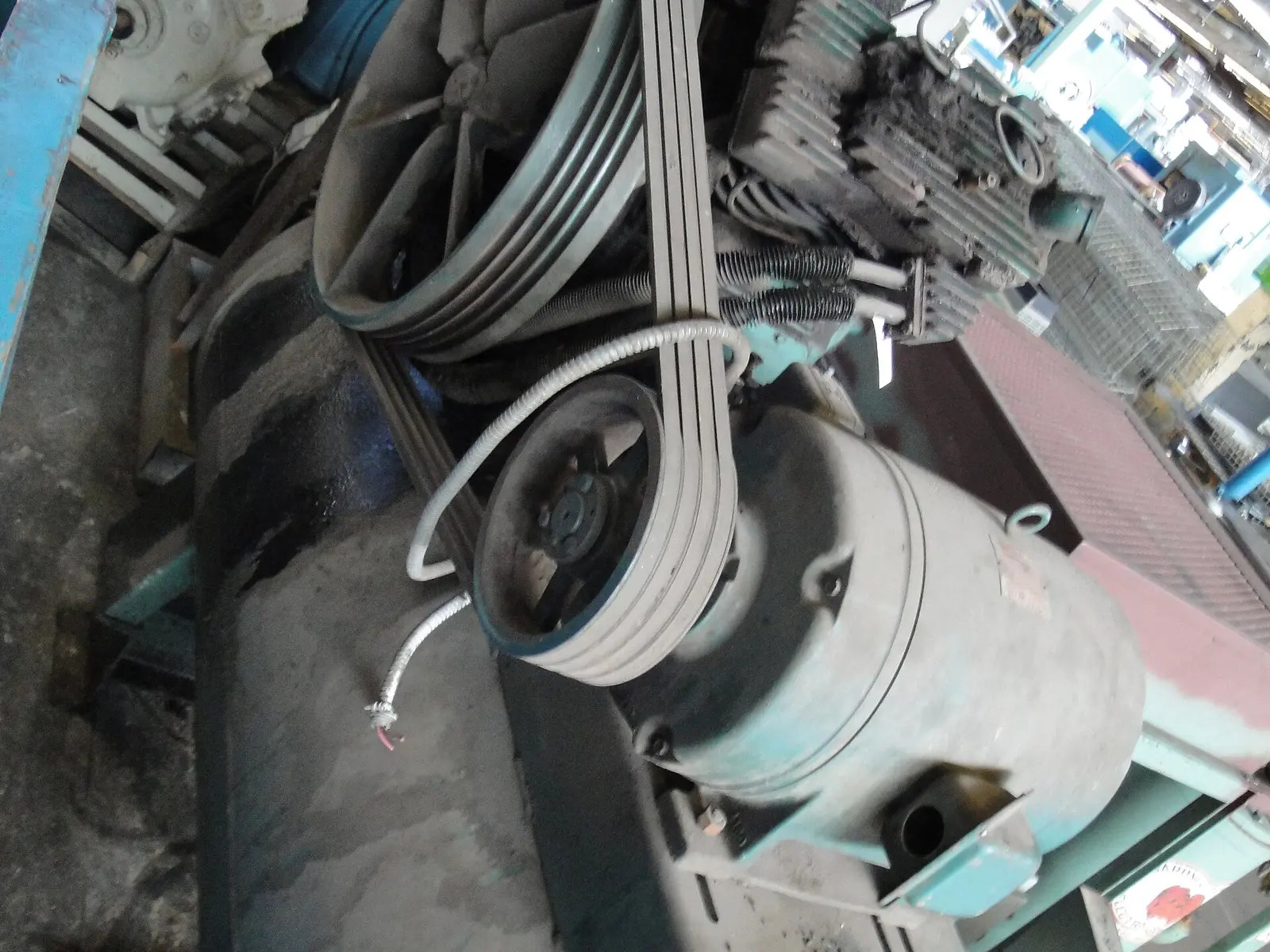A multiple V-belt drive on an industrial motor